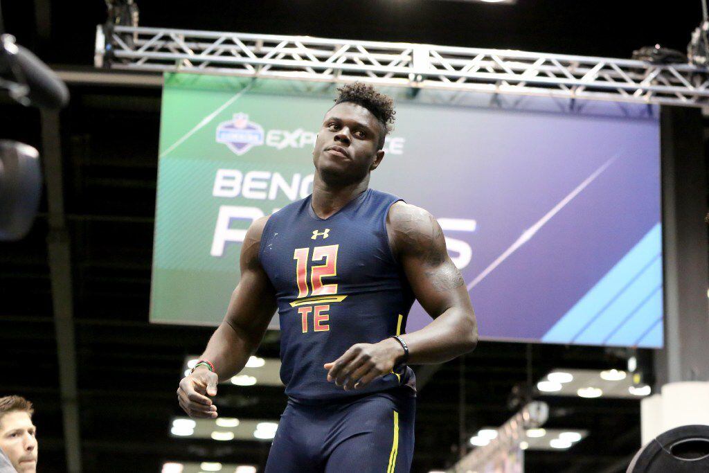 Miami tight end David Njoku performs the bench press at the 2017 NFL football scouting...