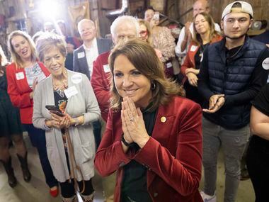 Sen. Angela Paxton smiles while listening to her election results on Tuesday, Nov. 8, 2022,...