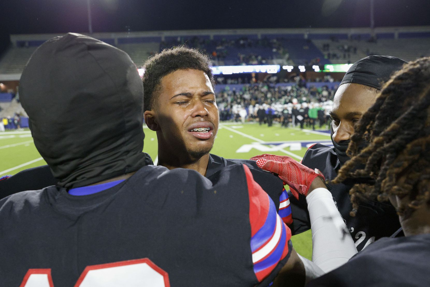 Duncanville quarterback Solomon Jones (3) is overcome with emotion after defeating Southlake...