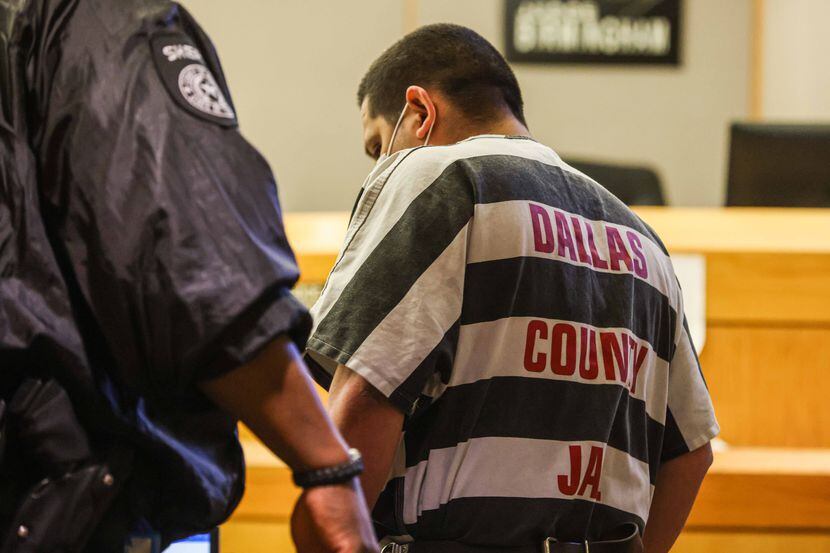 Armando Juarez enters the court Friday, Jan. 15, 2021, to plead guilty in the slaying of...