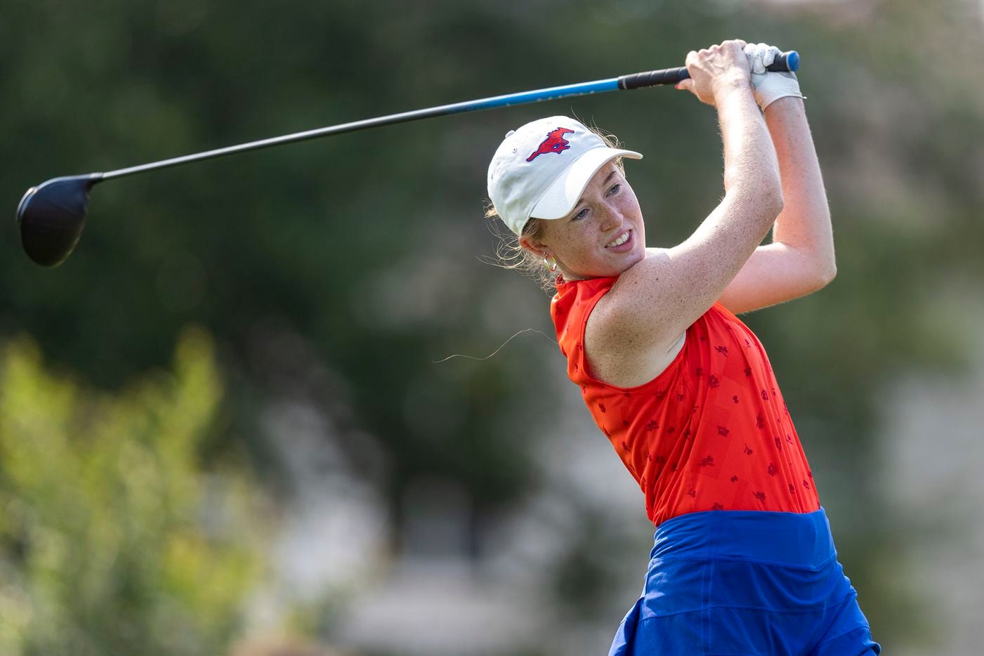 Grapevine’s Audrey Jackson hits from the 11th tee box during the 5A girls state golf...