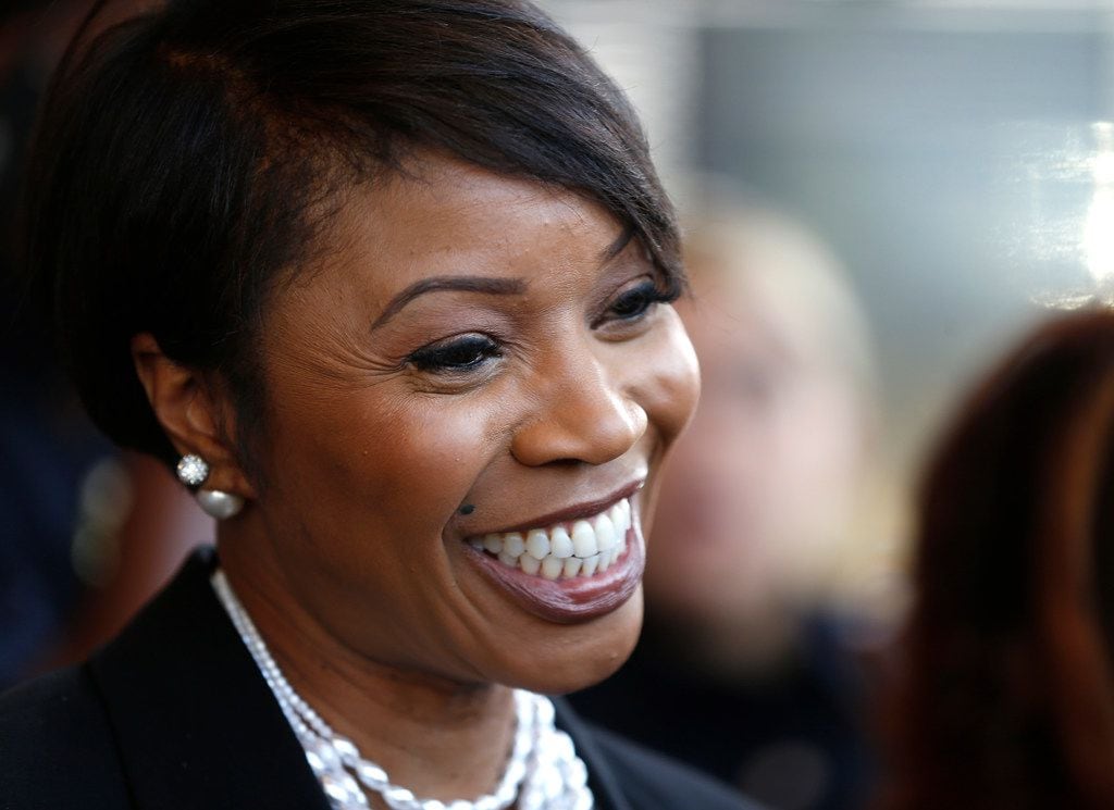 New Dallas Police Chief U. Renee Hall smiles during a meet-and-greet reception organized by...
