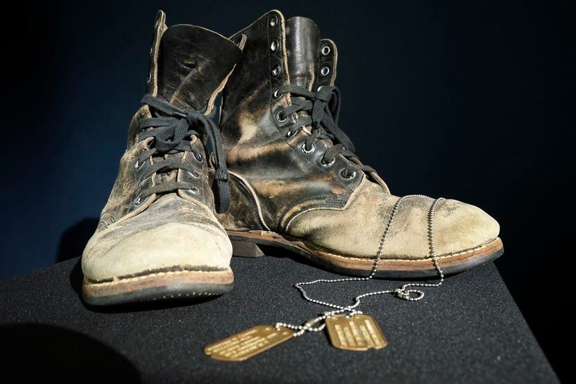 Combat boots and dog tags worn by Alan Alda as he portrayed the wisecracking surgeon Hawkeye...
