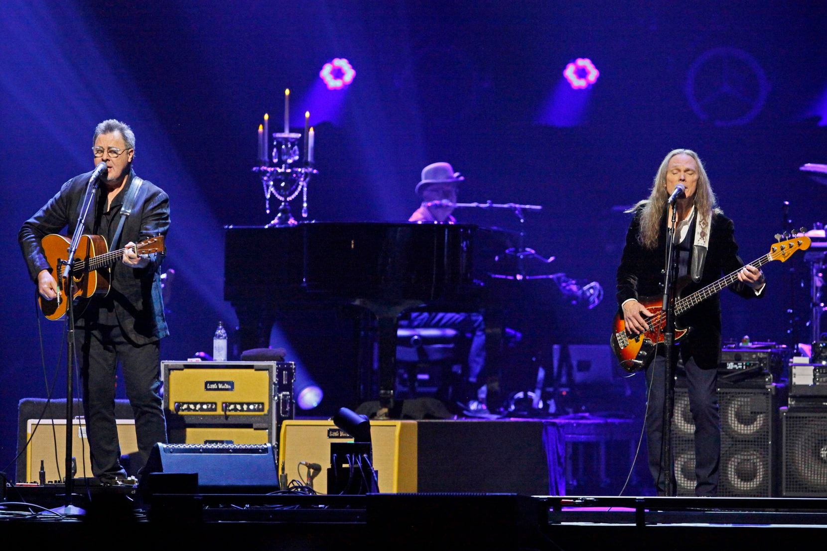 Members of the American rock band the Eagles perform at the American Airlines Center in...