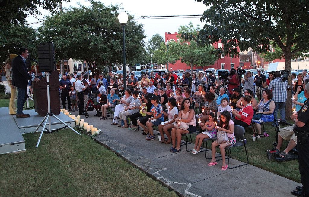 McKinney Mayor George Fuller led a candle light vigil for area residents held at Dr. Glenn...