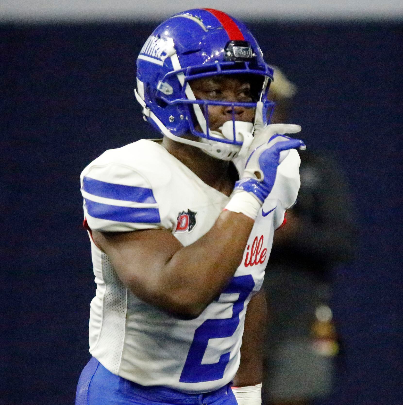 Duncanville High School running back Jordan Crook (2) signals the crowd to hush after scoring a touchdown during the first half as DeSoto High School played Duncanville High School in the Class 6A Division I Region II final playoff game at the Ford Center in Frisco on Saturday, December 4, 2021. (Stewart F. House/Special Contributor)