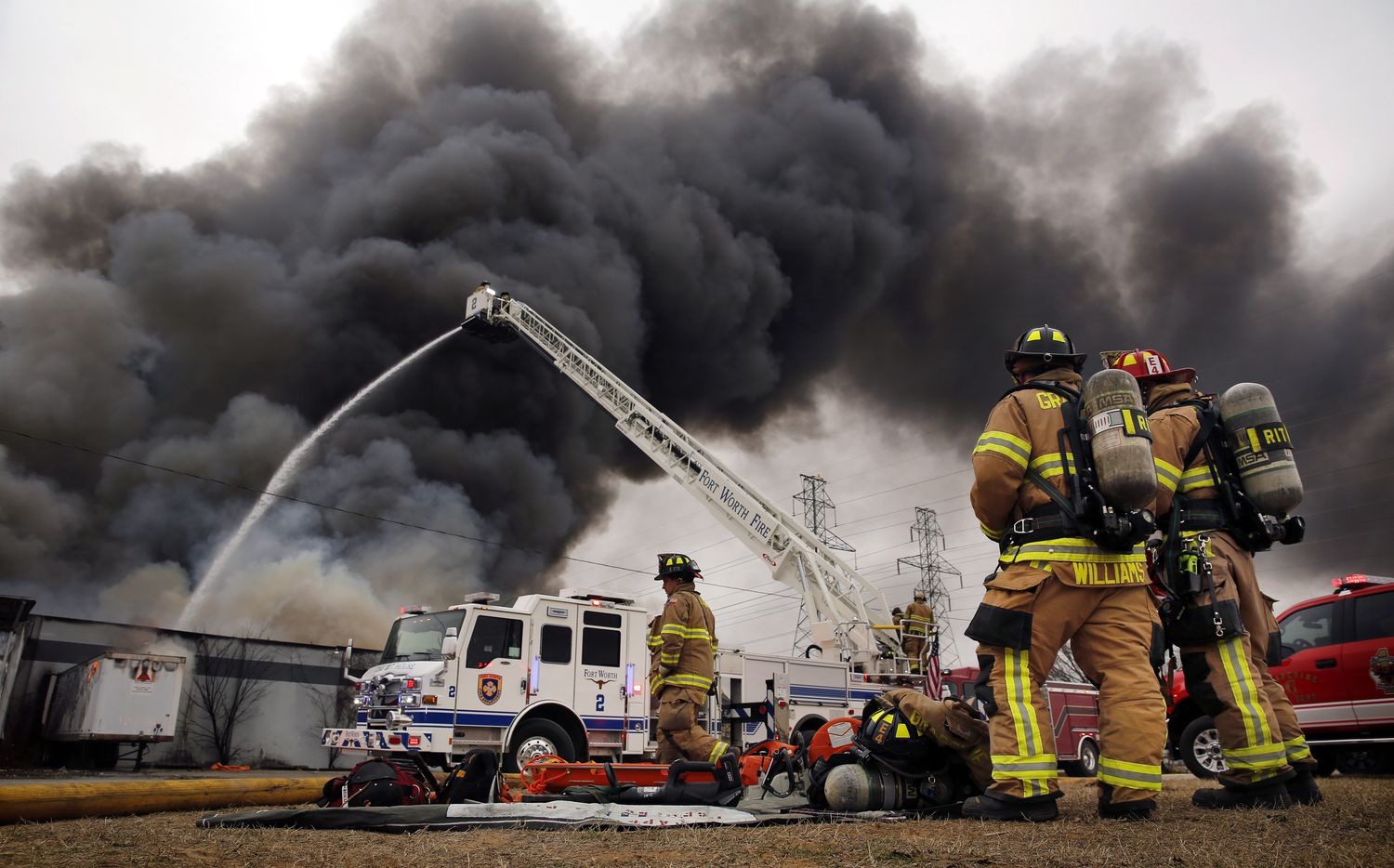 Fort Worth firefighters respond to a large 5-alarm fire at the Advanced Foam Recycling facility in Richland Hills, Texas, Thursday, February 25, 2021. Advanced Foam Recycling recycles materials to be processed and used for carpet underlay, pillows, and furniture, according to the company website. Over 125 firefighters from Richland Hills, Haltom City, North Richland Hills and Fort Worth assisted on the commercial structure fire in the 2500 block of Handley Ederville Road in E. Fort Worth. (Tom Fox/The Dallas Morning News)