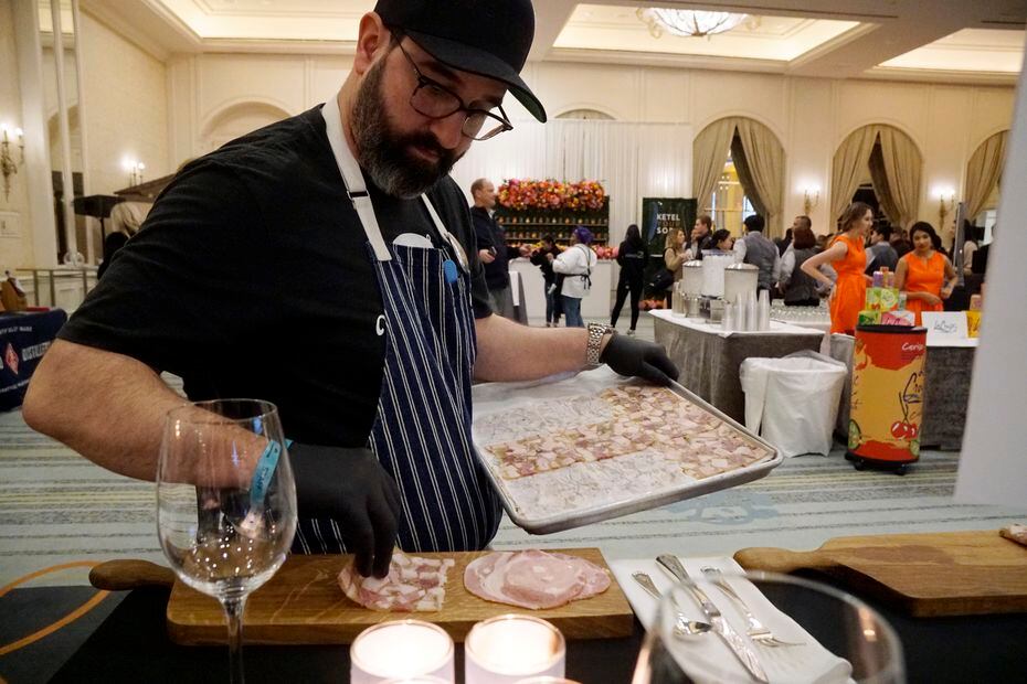 Chef David Uygur adds head cheese to a plate at Cochon555 in 2019. 2020 will be the food...