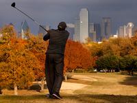 Fall color envelops Stevens Park Golf Course in north Oak Cliff as Chester Tyson of DeSoto...