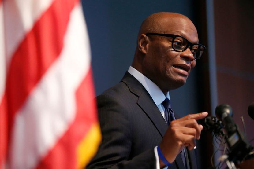 Chief David Brown pauses while speaking during a press conference at the Dallas Police...