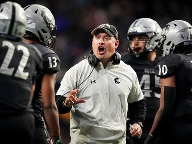 Denton Guyer head coach Reed Heim instructs his players during the first half of a Class 6A...