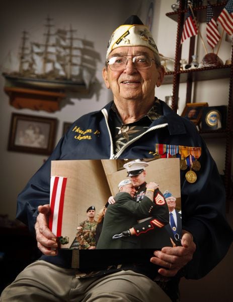 Pearl Harbor survivor Houston James, 87, said he'd love to again see the Marine he hugged so...