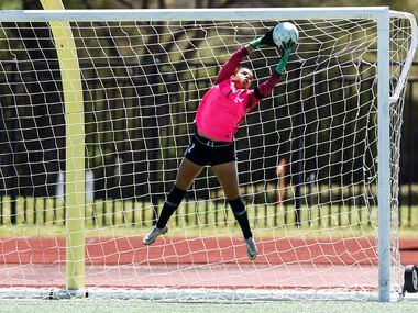 Frisco goalkeeper Ariana Anderson catches a shot on goal during the Class 5A Region II...