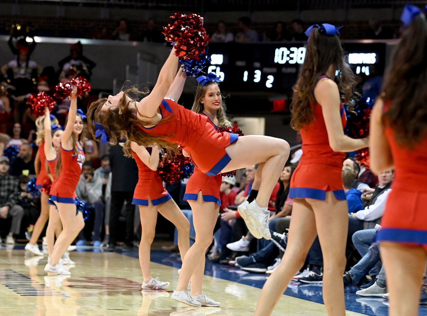 SMU cheerleaders perform during a timeout in the second half during a men’s NCAA basketball...