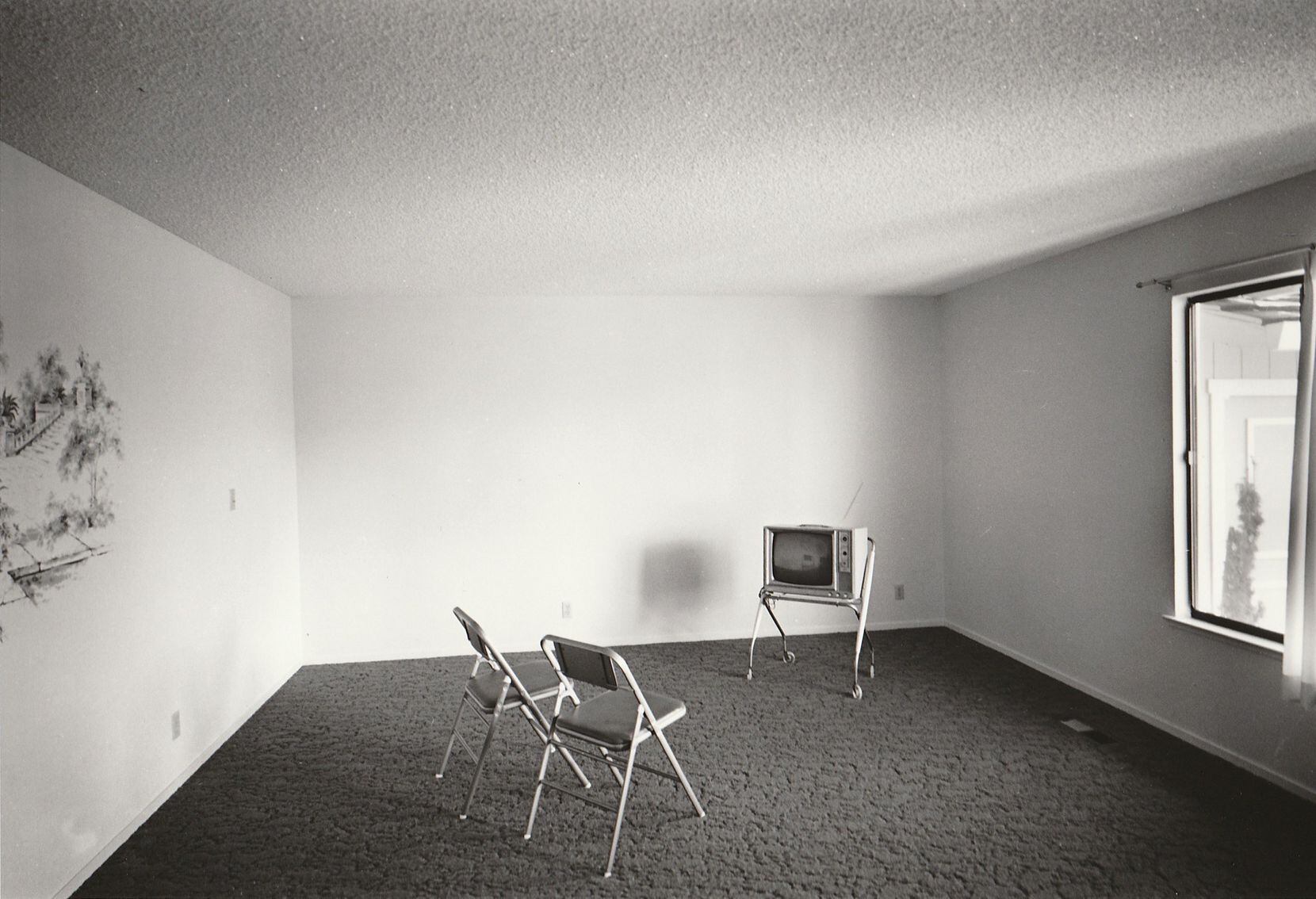 Bill Owens' "Empty room with 2 chairs" captures the transitory nature of suburban living for many residents. (Courtesy of PDNB Gallery, Dallas)