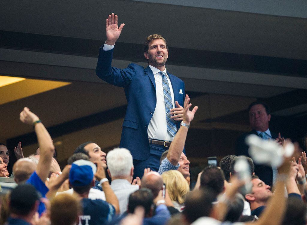 Former Dallas Mavericks player Dirk Nowitzki waves as he's introduced during the first quarter of an NFL game between the New York Giants and Dallas Cowboys on Sunday, September 8, 2019 at AT&T Stadium in Arlington. (Ashley Landis/The Dallas Morning News)