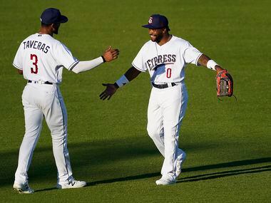 Round Rock Express outfielders Delino DeShields and Leody Taveras take the field for the...