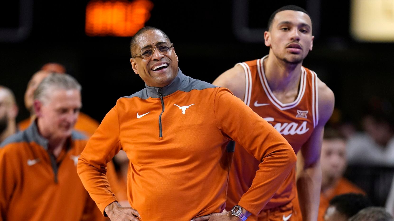 Texas acting head coach Rodney Terry reacts to a call against his team during the first half...