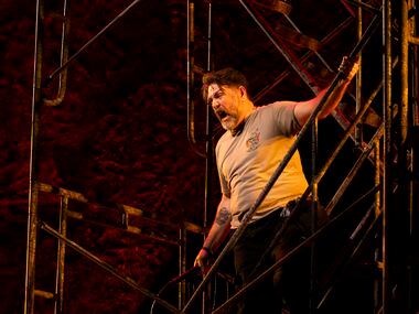 Baritone Michael Mayes performs during staging rehearsal on a scaffolding made by Dallas...