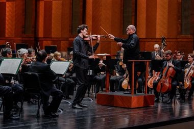 Violinist Stephen Waarts performs with music director Robert Spano and the Fort Worth...