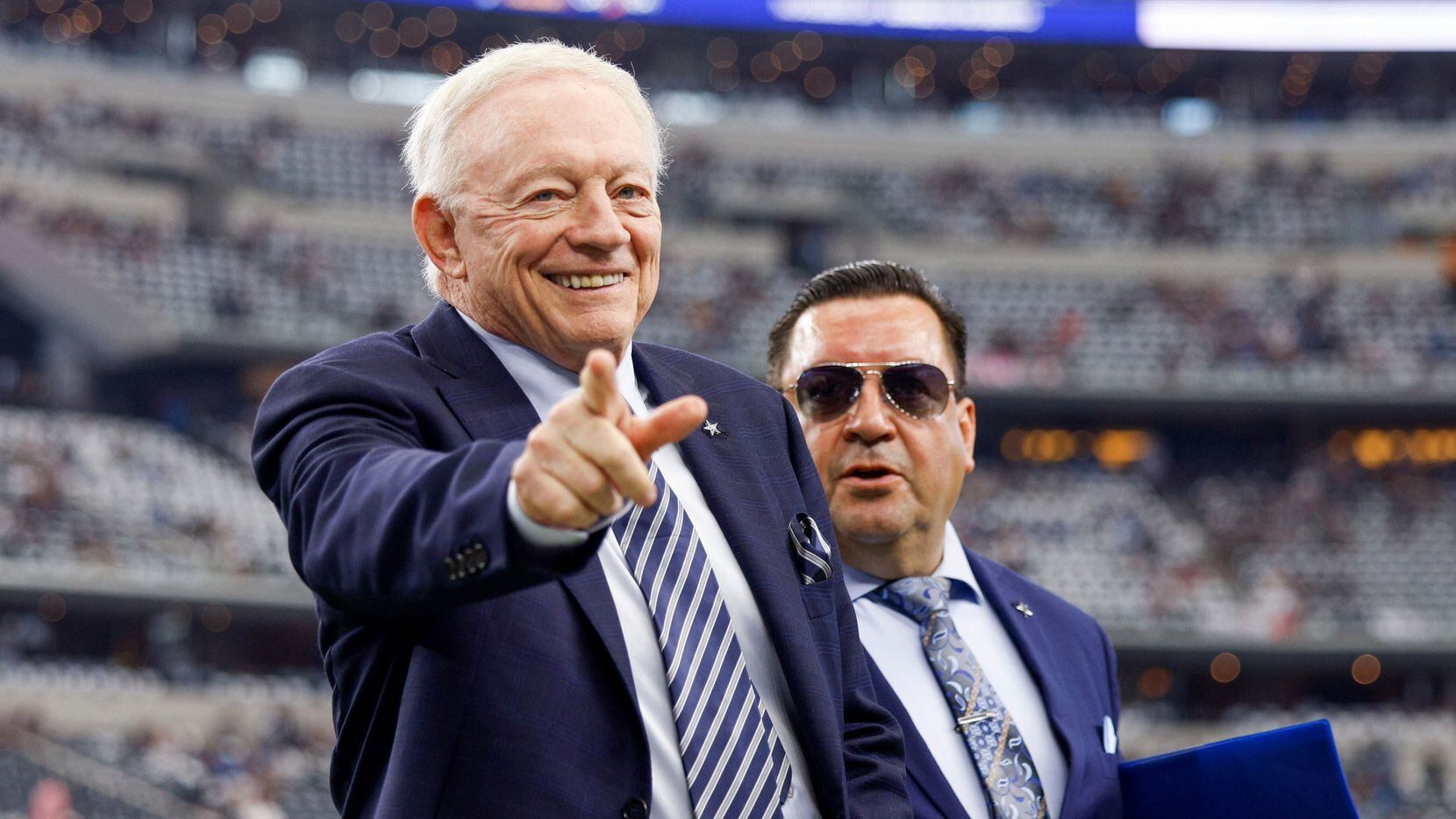 Dallas Cowboys Jerry Jones walks the field before a NFL game against the Detroit Lions at...
