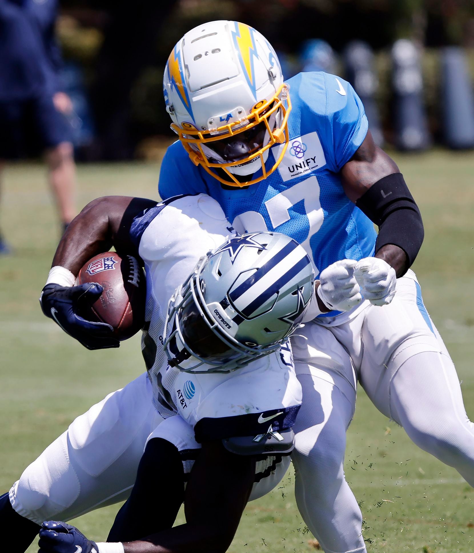 Los Angeles Chargers cornerback Kemon Hall (37) collides with Dallas Cowboys running back...