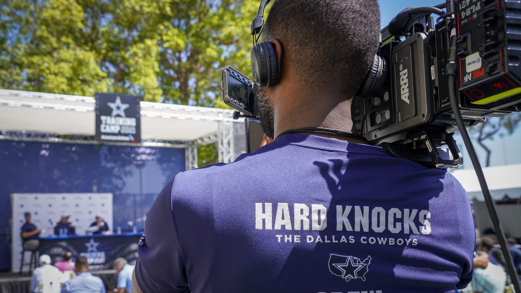 A HBO Hard Knocks crew records the opening news conference for the Dallas Cowboys training...