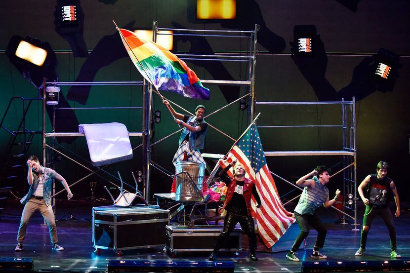 Actors perform during an opening scene at a dress rehearsal for Green Day's American Idiot,...