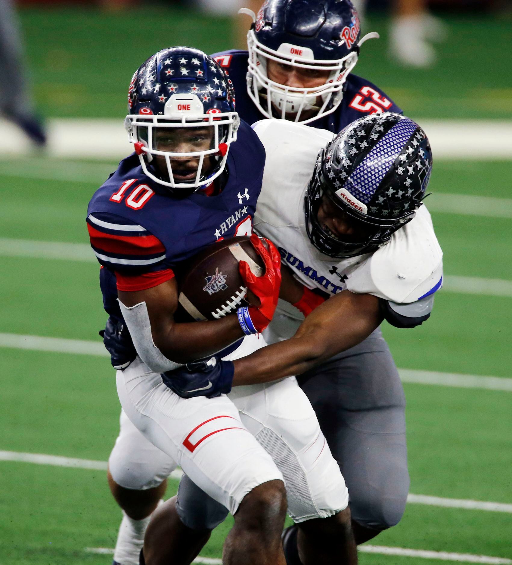 Denton Ryan’s Kalib Hicks (10) picks up a couple of yards under pressure during the first...