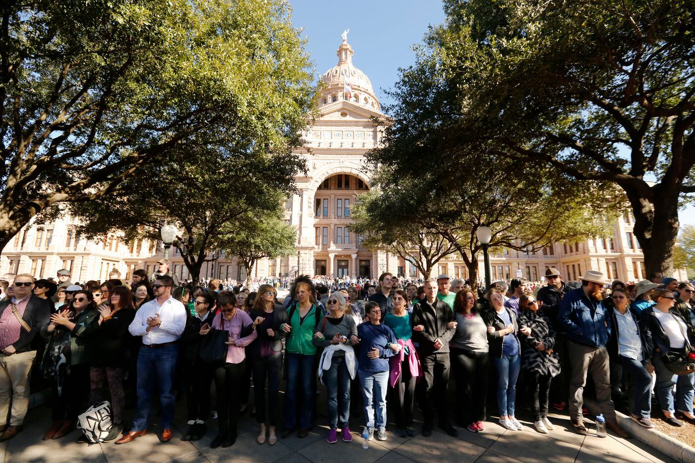 A crowd gathers for a press conference at the steps of the Texas Capitol during the Texas...