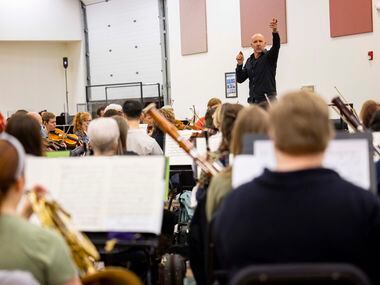 Music director Emmanuel Villaume conducts during the orchestral rehearsal for Dallas Opera’s...