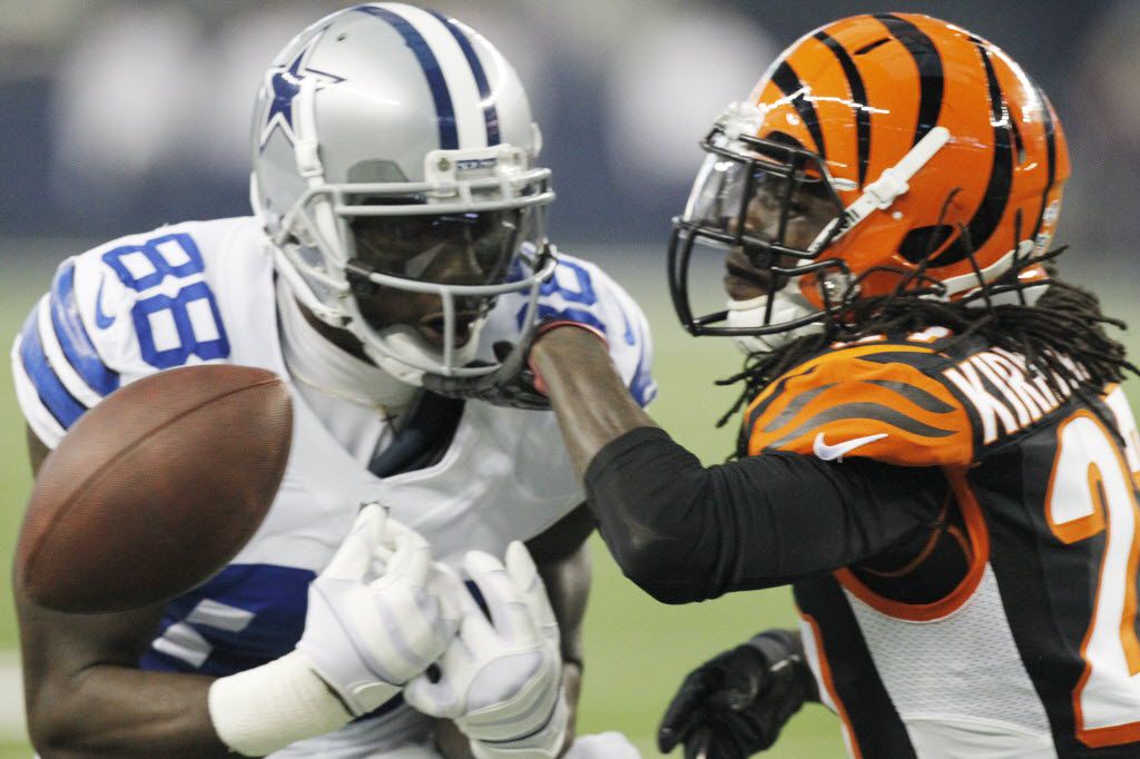 Dallas Cowboys wide receiver Dez Bryant (88) has a ball bounce from him as he is defended by Cincinnati Bengals cornerback Dre Kirkpatrick (27) during their NFL football game in Arlington, Texas, on August 24, 2013. (Michael Ainsworth/The Dallas Morning News)