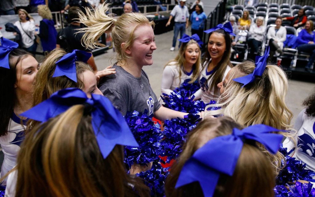 The Byron Nelson's Grace Ver Meer (16) celebrates after winning a class 6A volleyball state...