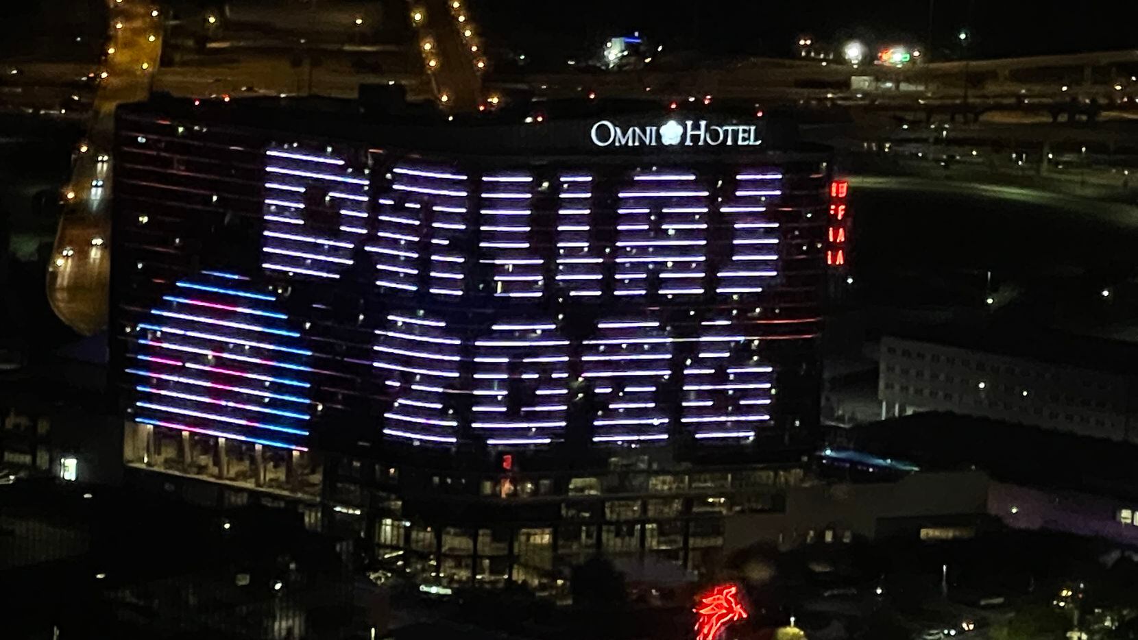 The Omni Hotel in downtown Dallas displays "Dallas 2020," in support of Dallas' bid to host...