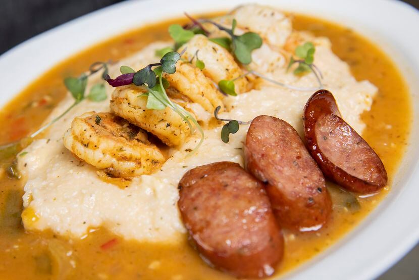 Brunchaholics shrimp and grits served with sausage at Soiree Coffee Bar.