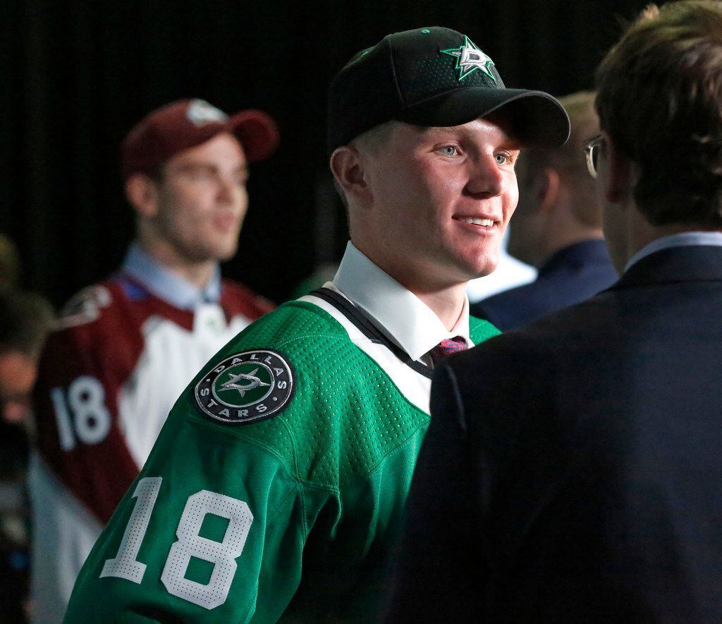 FILE - Dallas Stars first round draft pick Ty Dellandrea talks with the media after being...