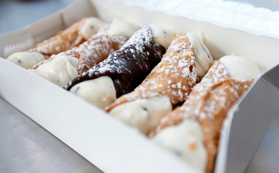The most famous items at Carlo's Bakery are the cannoli.