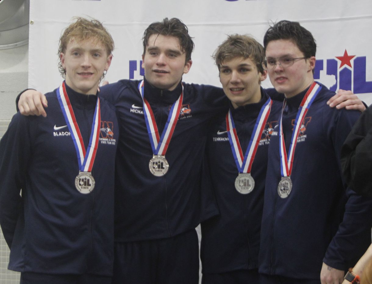Members of the Frisco Wakeland swim team claim the silver medal in the 5A Boys overall...