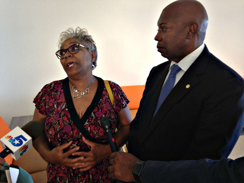 Marsha Jackson (lef), and Dallas City Council member Tennell Atkins following Wednesday's...