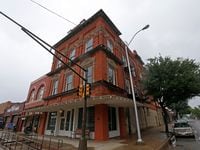 The 100 West building in downtown Corsicana offers both private and communal studios, a wood...