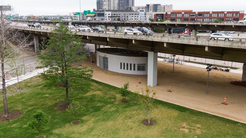 A maintenance building for Carpenter Park sits under Central Expressway in Dallas, Friday,...