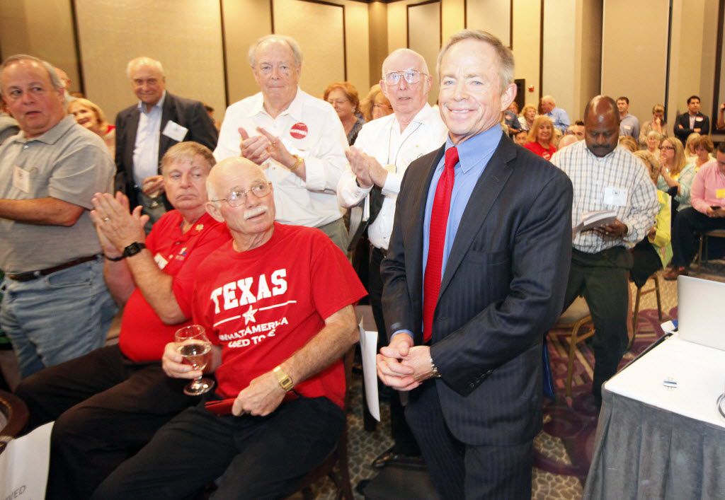 Newly elected chair of the Dallas County Republican Party Phillip Huffines, right.