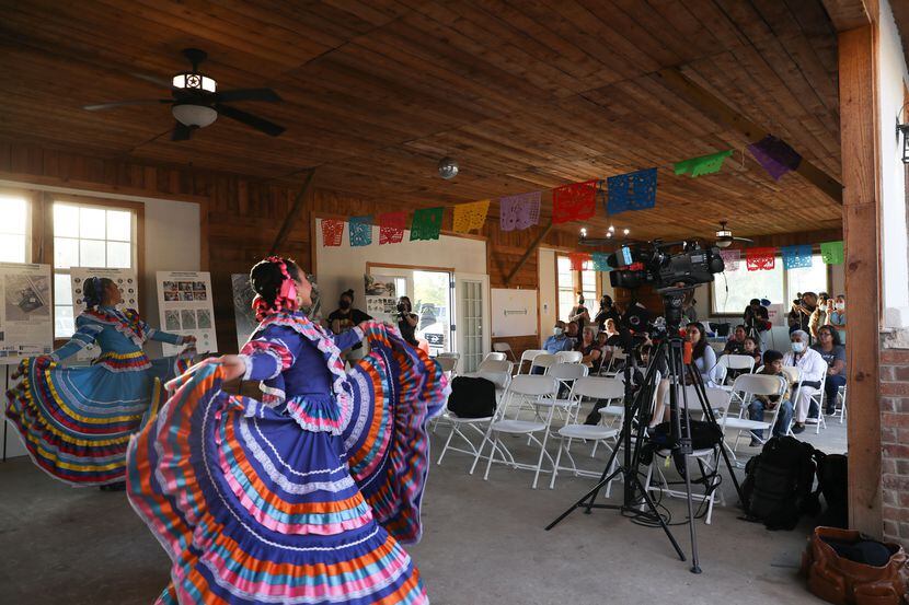 Members of the Anita N. Martinez Ballet Folklorico perform several dances at the reveal...