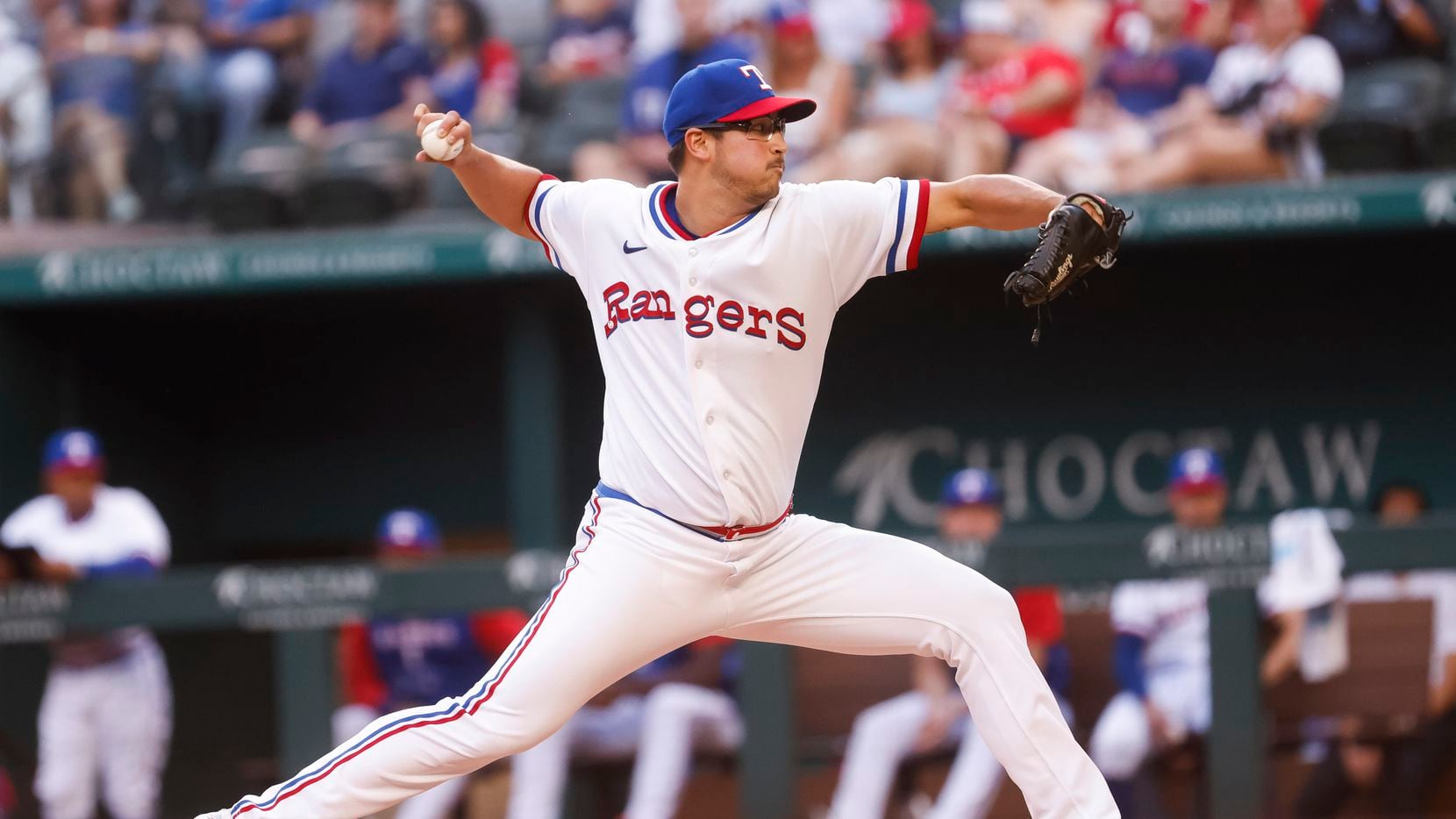 Texas Rangers starting pitcher Dane Dunning (33) pitches during the third inning against the...