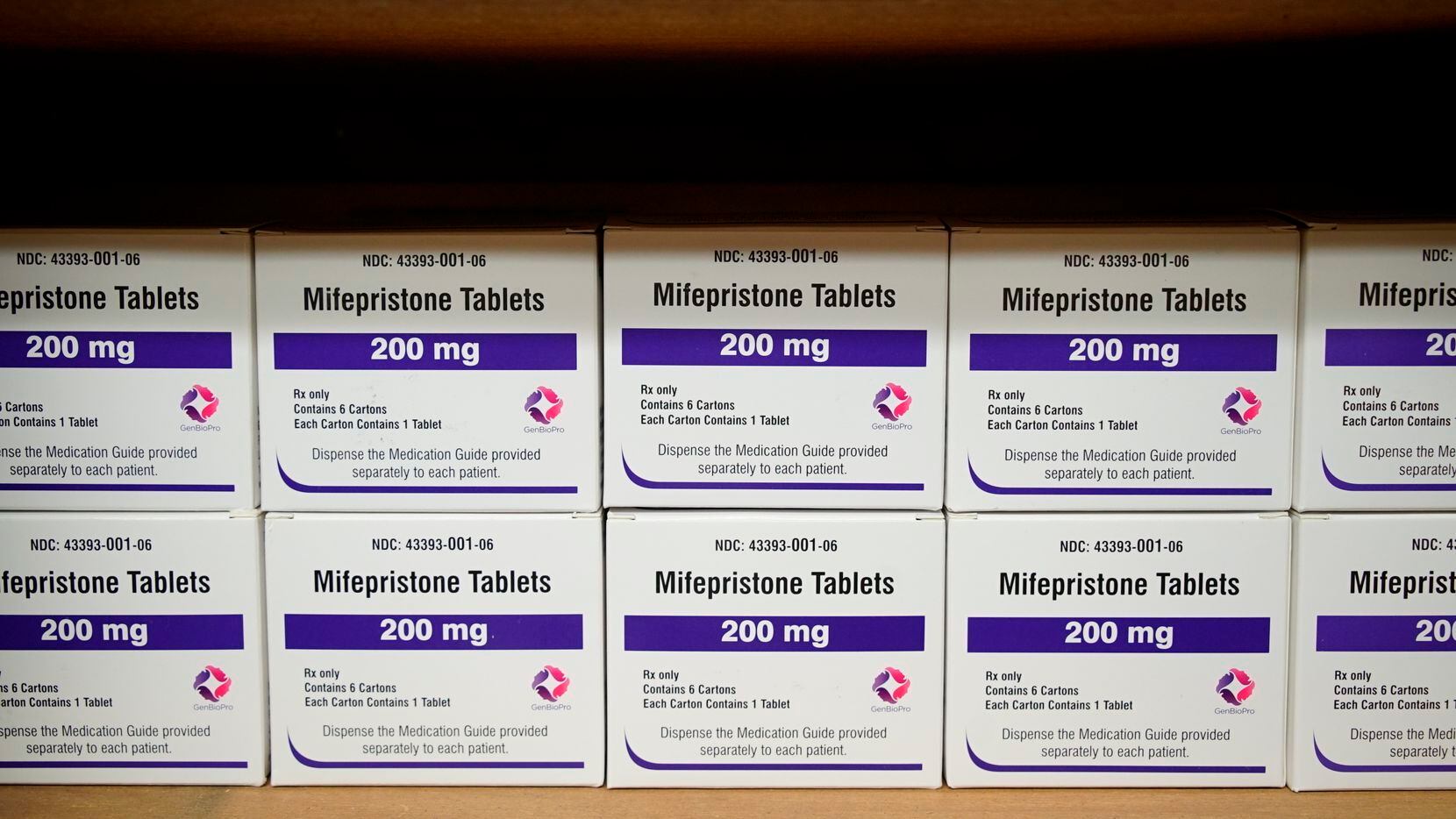 FILE - Boxes of the drug mifepristone line a shelf at the West Alabama Women's Center in...