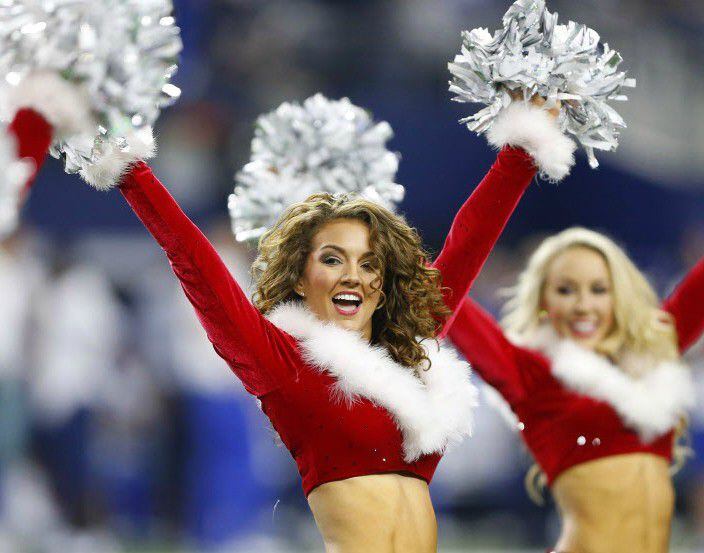 The Dallas Cowboys Cheerleaders perform in their holiday outfits.