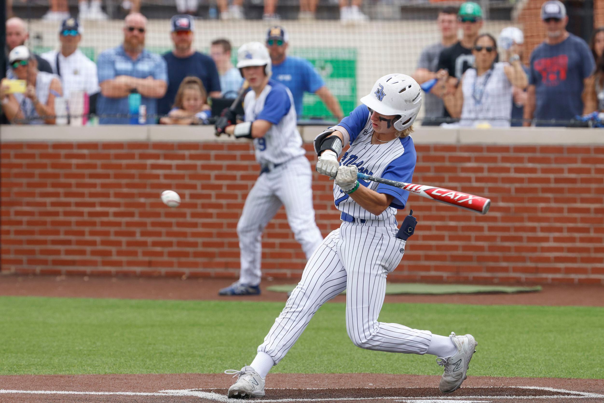Byron Nelson’s Landon Farco hits during a baseball game against Denton Guyer on Saturday,...