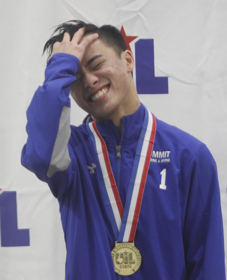 Mansfield Summit diver Benedict Nguyen reacts after receiving his first place medal in 5A ...