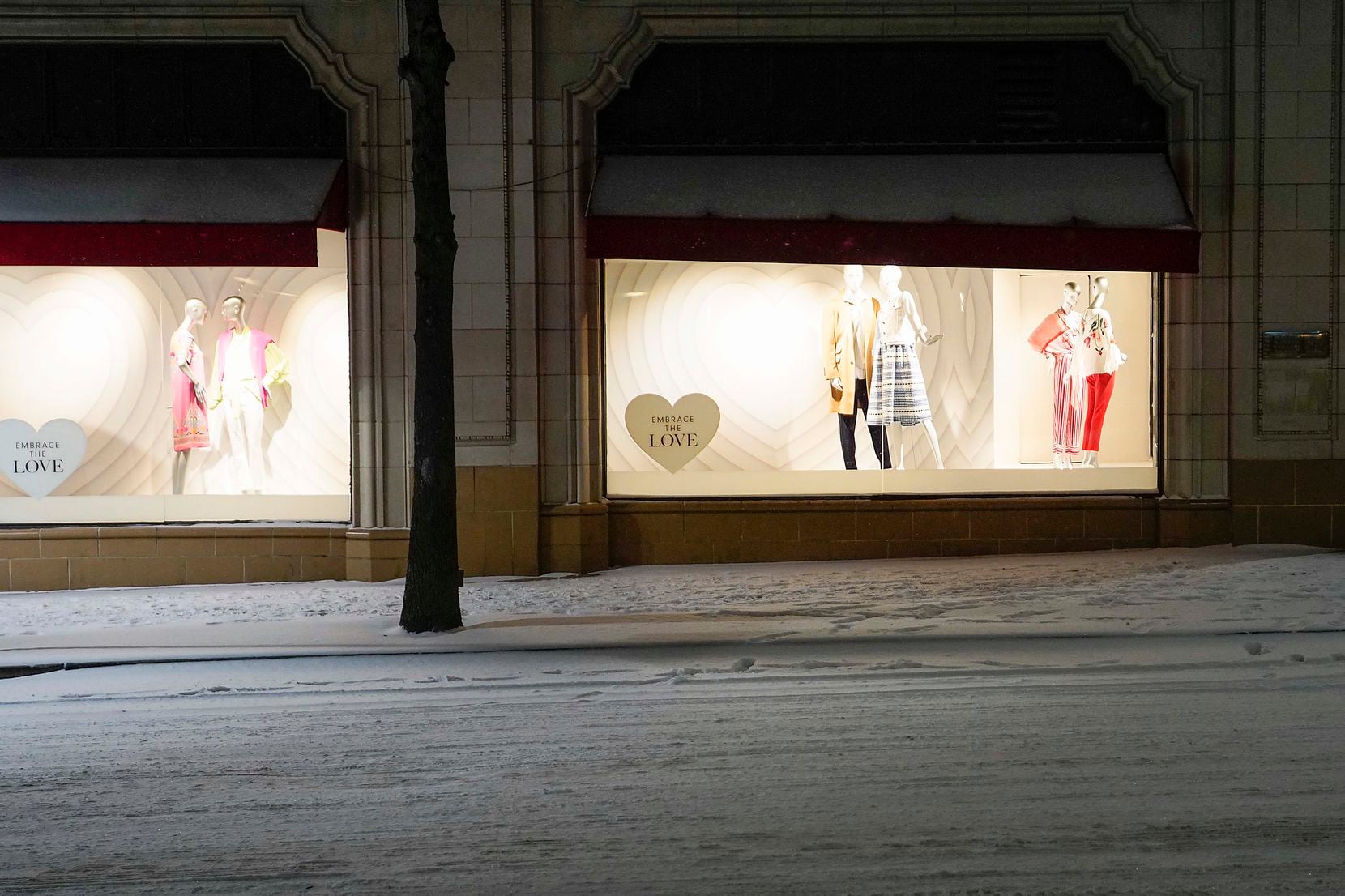 Valentines Day themed windows at the Neiman Marcus flagship store downtown are framed by...