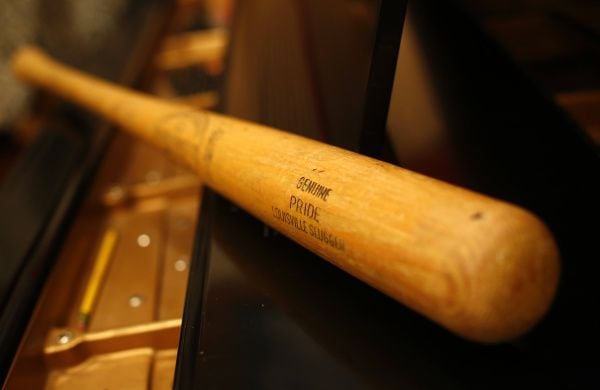 A baseball bat of country star Charley Pride is part of his collection of memorabilia being...